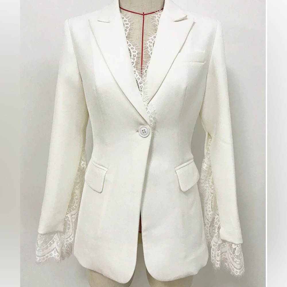 Lace jacket as shown in picture. It will fit Size 8.
